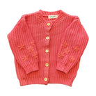 Pink knitted cardigan with floral patterns 